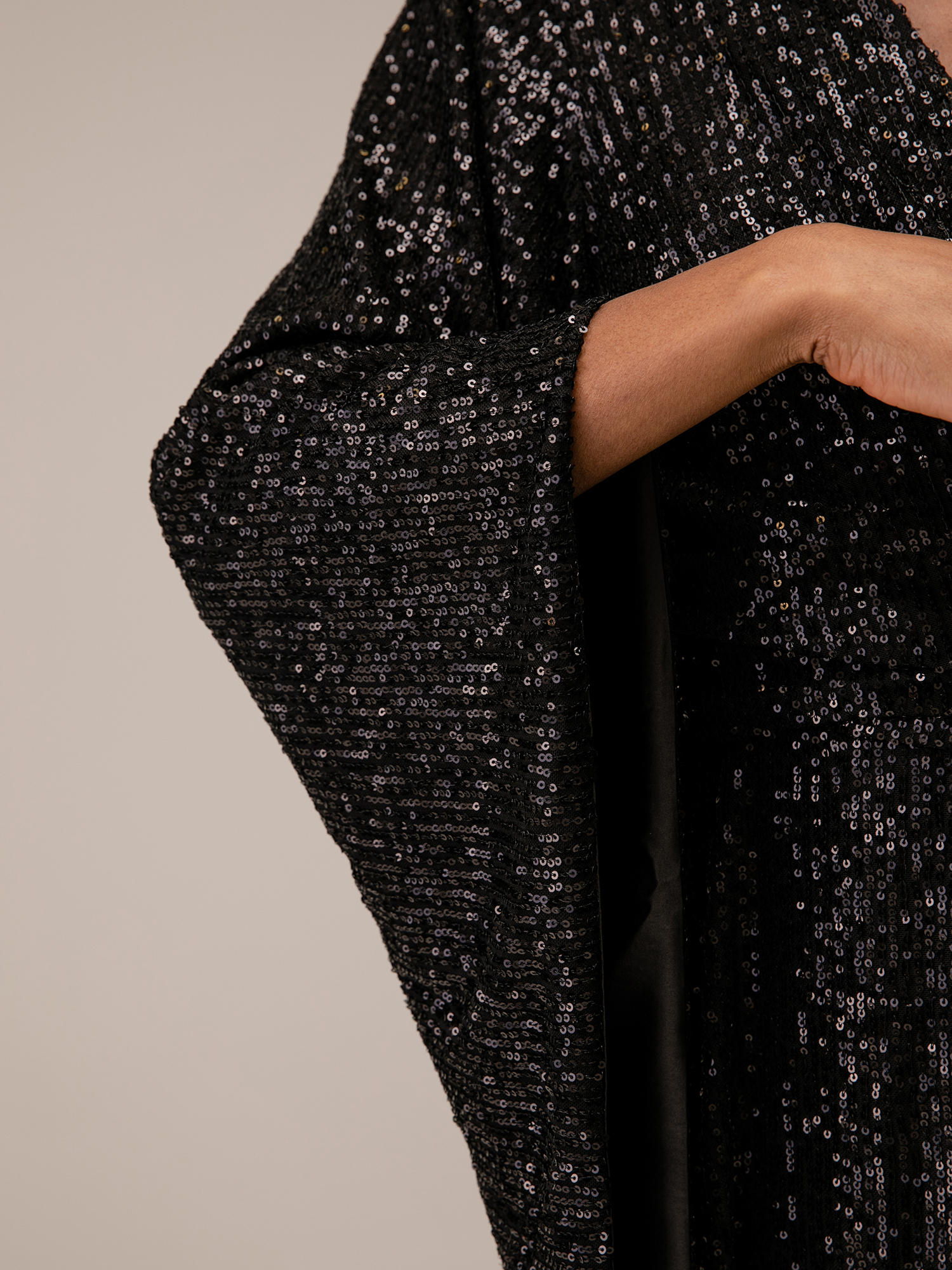 Detailansicht von Kurze Paillettenbluse von JADICTED