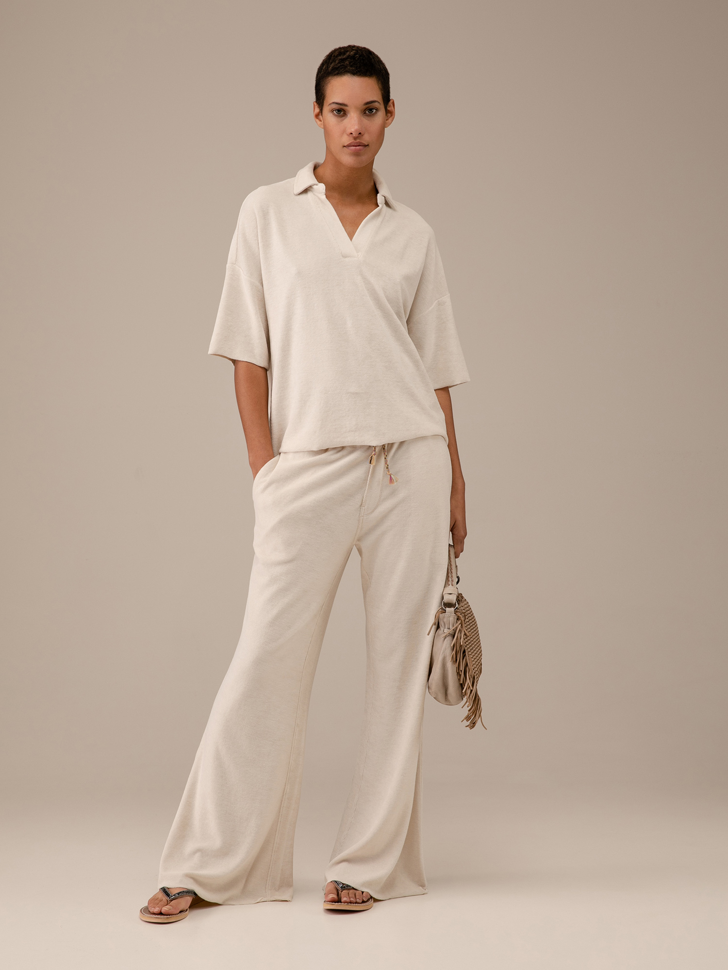 Detailansicht von Kurzarm-Poloshirt in Frotteeoptik von LOVE JOY VICTORY